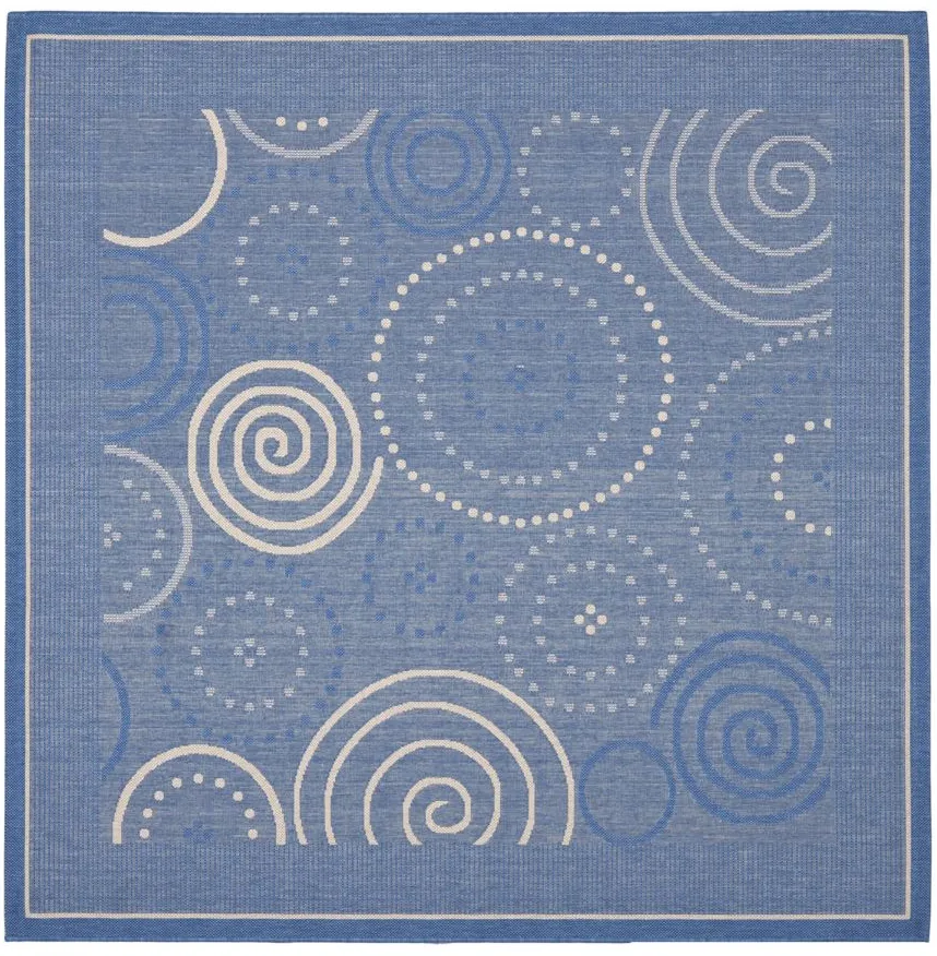 Courtyard Circles Indoor/Outdoor Area Rug in Blue & Natural by Safavieh