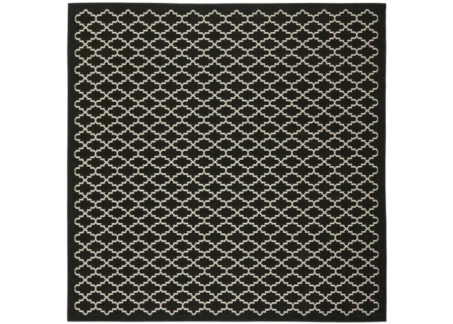 Courtyard Link Indoor/Outdoor Area Rug in Black & Beige by Safavieh