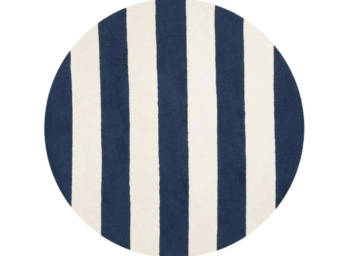 Gavin Kid's Area Rug in Navy/Ivory by Safavieh