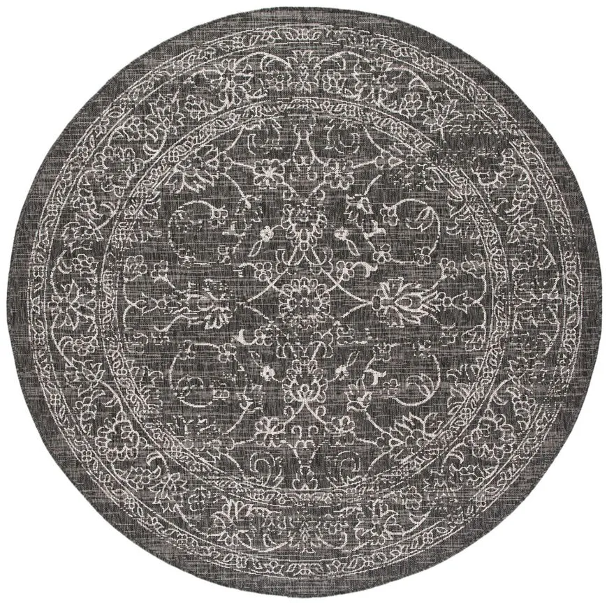 Courtyard Pacific Indoor/Outdoor Area Rug Round in Black & Ivory by Safavieh