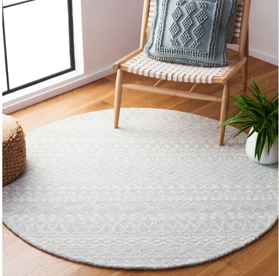 Strobe Area Rug in Aqua & Cream by Safavieh