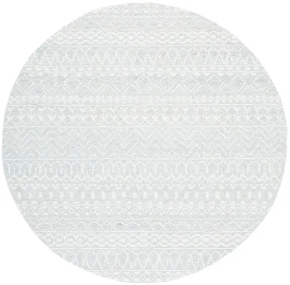 Strobe Area Rug in Aqua & Cream by Safavieh