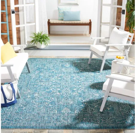 Courtyard Pacific Indoor/Outdoor Area Rug in Turquoise by Safavieh