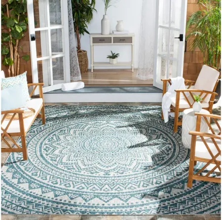 Courtyard Mandala Indoor/Outdoor Area Rug in Light Gray & Teal by Safavieh