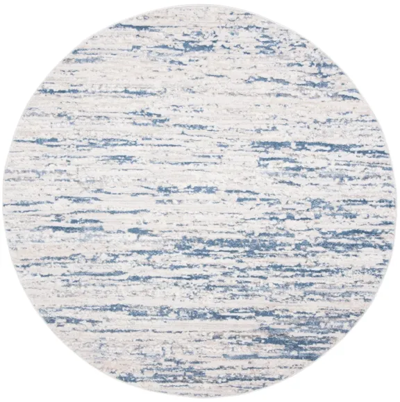 Amelia Area Rug in Ivory / Blue by Safavieh