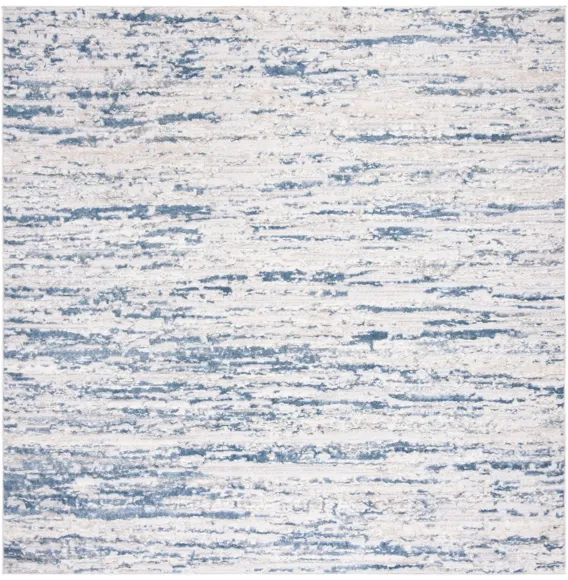 Amelia Area Rug in Ivory / Blue by Safavieh