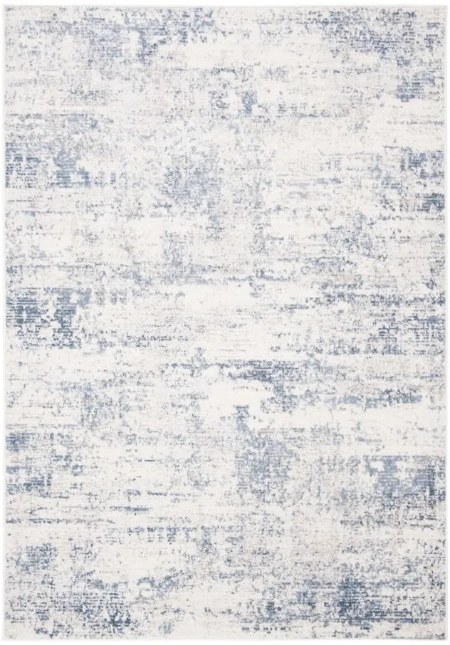 Amelia Area Rug in Ivory / Blue by Safavieh