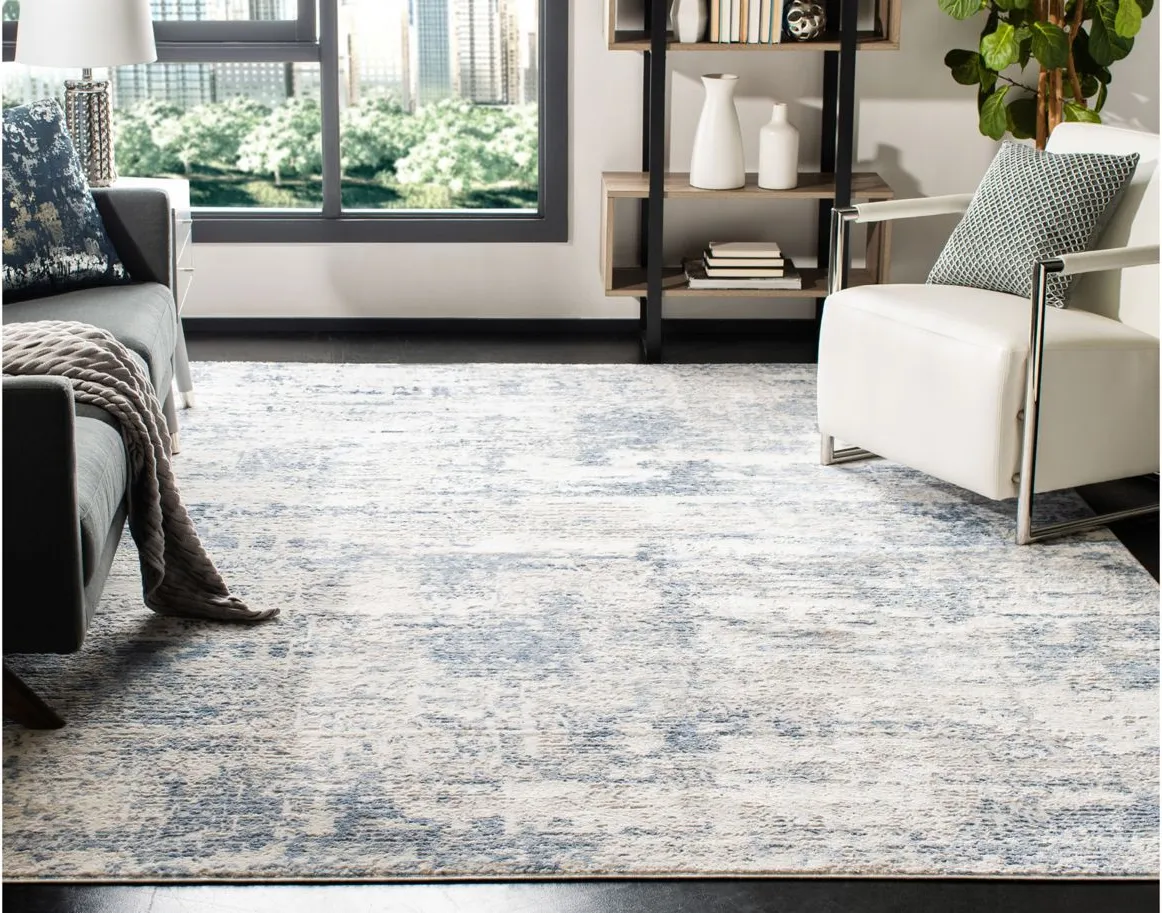 Amelia Area Rug in Ivory / Blue by Safavieh