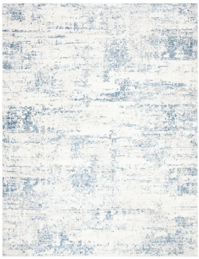 Amelia Area Rug in Ivory / Blue by Safavieh