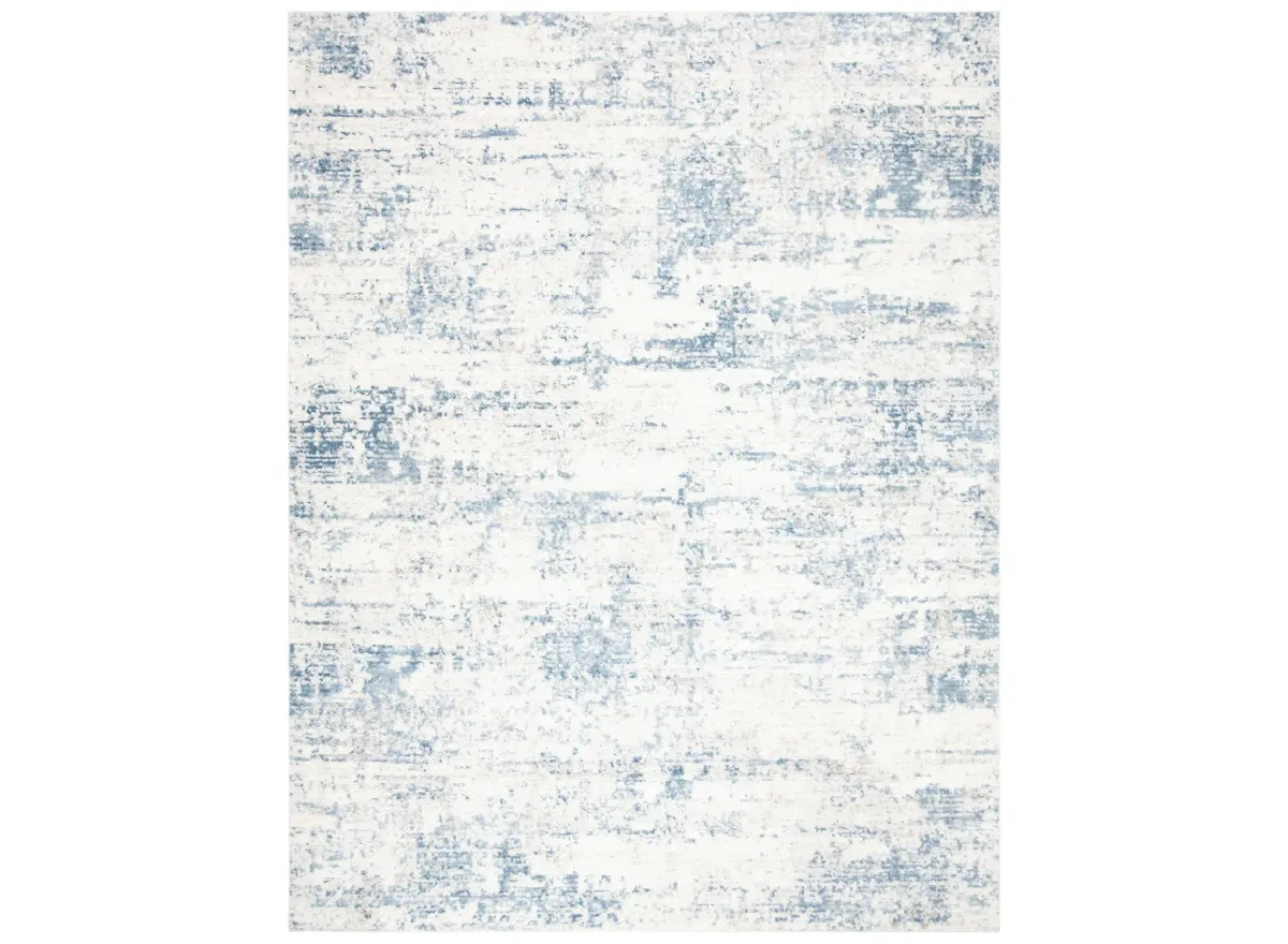 Amelia Area Rug in Ivory / Blue by Safavieh