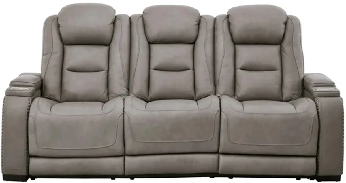 The Man-Den Power Recliner Sofa with Adjustable Headrest in Gray by Ashley Furniture