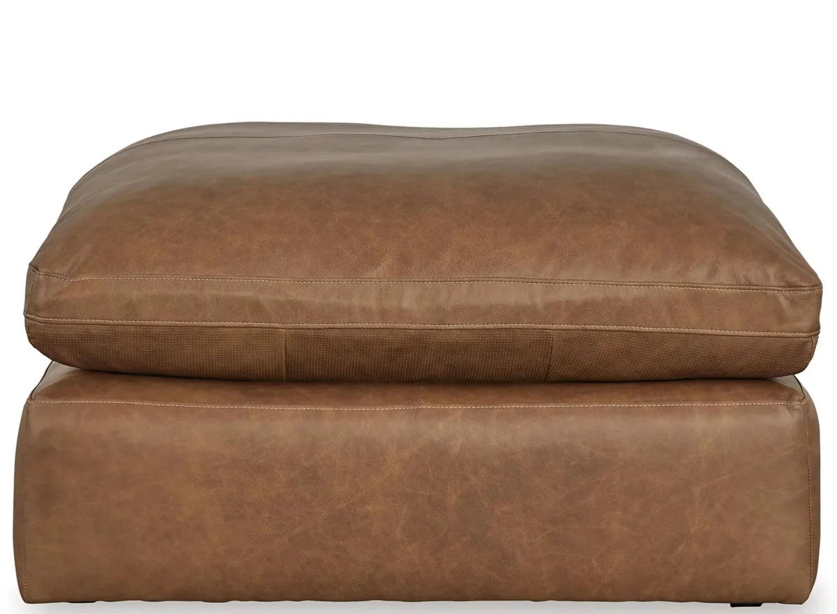 Emilia Oversized Ottoman in Caramel by Ashley Furniture