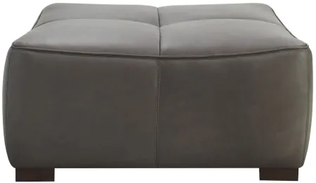 Burchill Leather Cocktail Ottoman in Brown by Davis Intl.