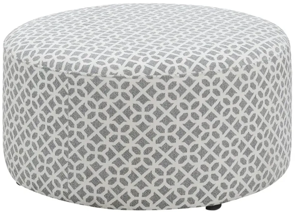 Walker Round Ottoman in Gray Lattice by Emerald Home Furnishings