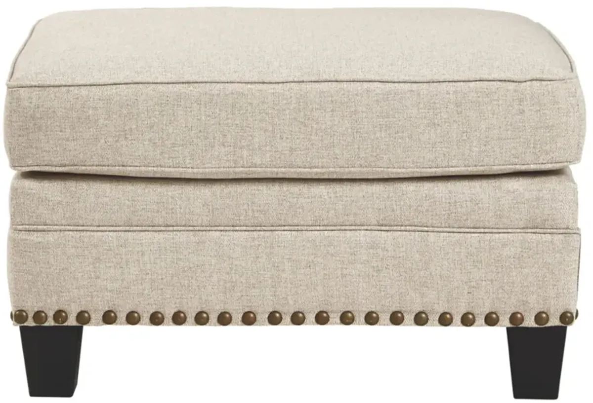 Claredon Ottoman in Linen by Ashley Furniture