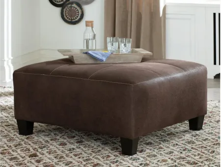 Navi Oversized Accent Ottoman in Chestnut by Ashley Furniture