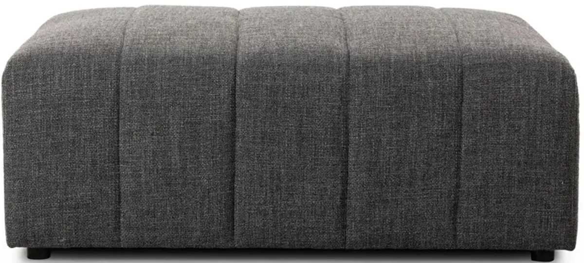 Langham Ottoman in Saxon Charcoal by Four Hands