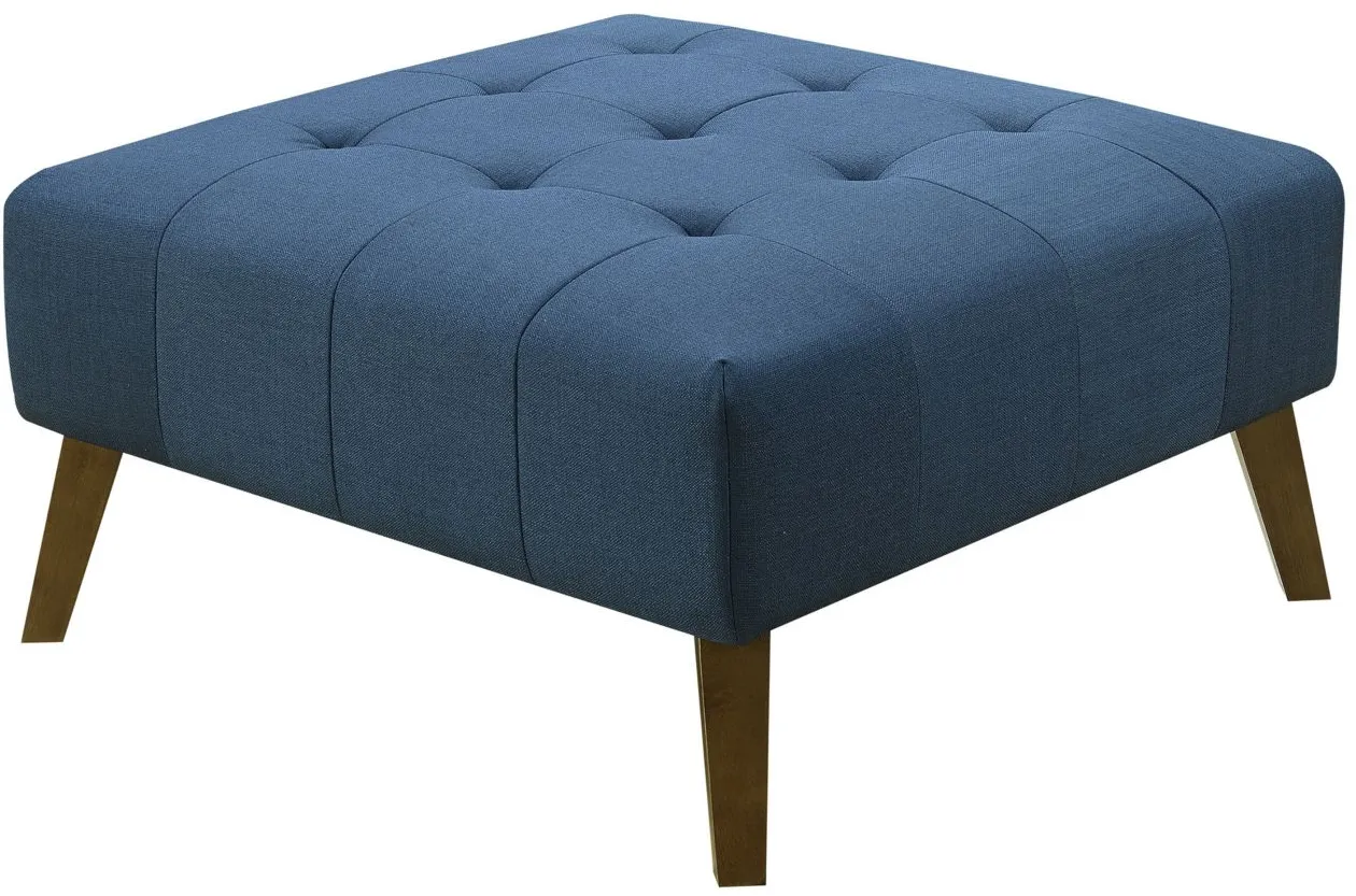Elise Ottoman in Navy Peacock by Emerald Home Furnishings