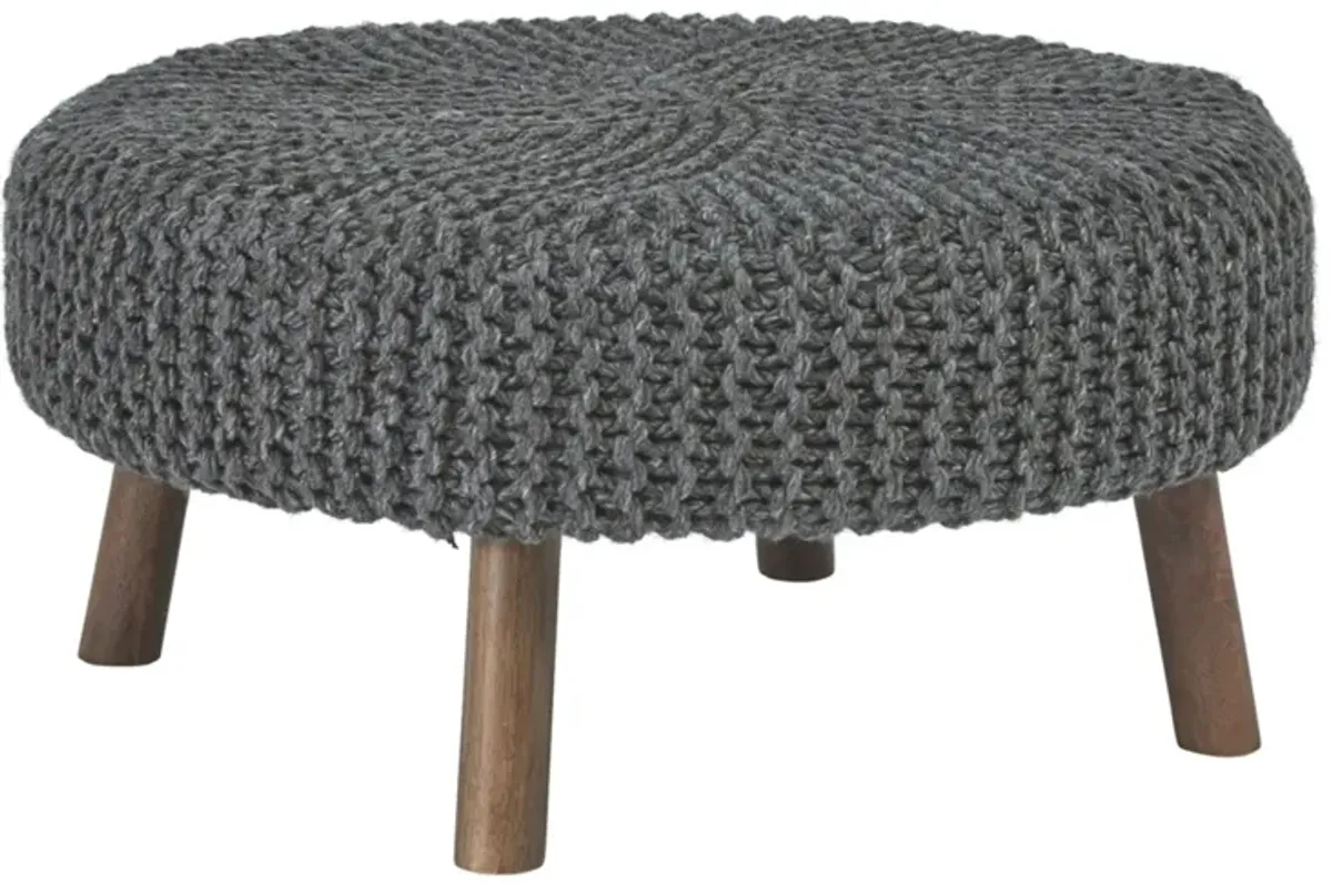 Jassmyn Ottoman in Charcoal by Ashley Express