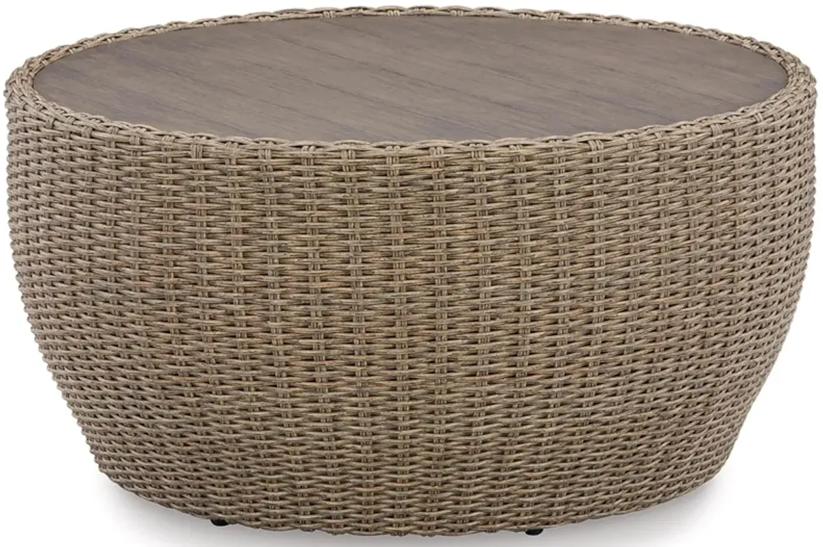 Danson Outdoor Coffee Table in Beige by Ashley Furniture