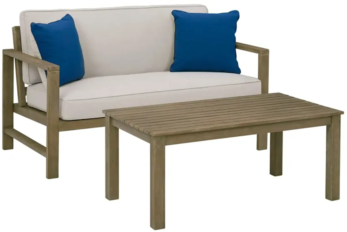 Fynnegan Outdoor Loveseat with Table in Pebble by Ashley Furniture