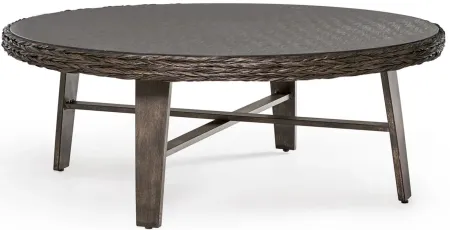 Grand Isle Dkc Round Outdoor Coffee Table in Dark Carmel by South Sea Outdoor Living