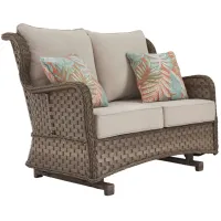 Clear Ridge Outdoor Loveseat Glider with Cushions in Driftwood Gray by Ashley Furniture