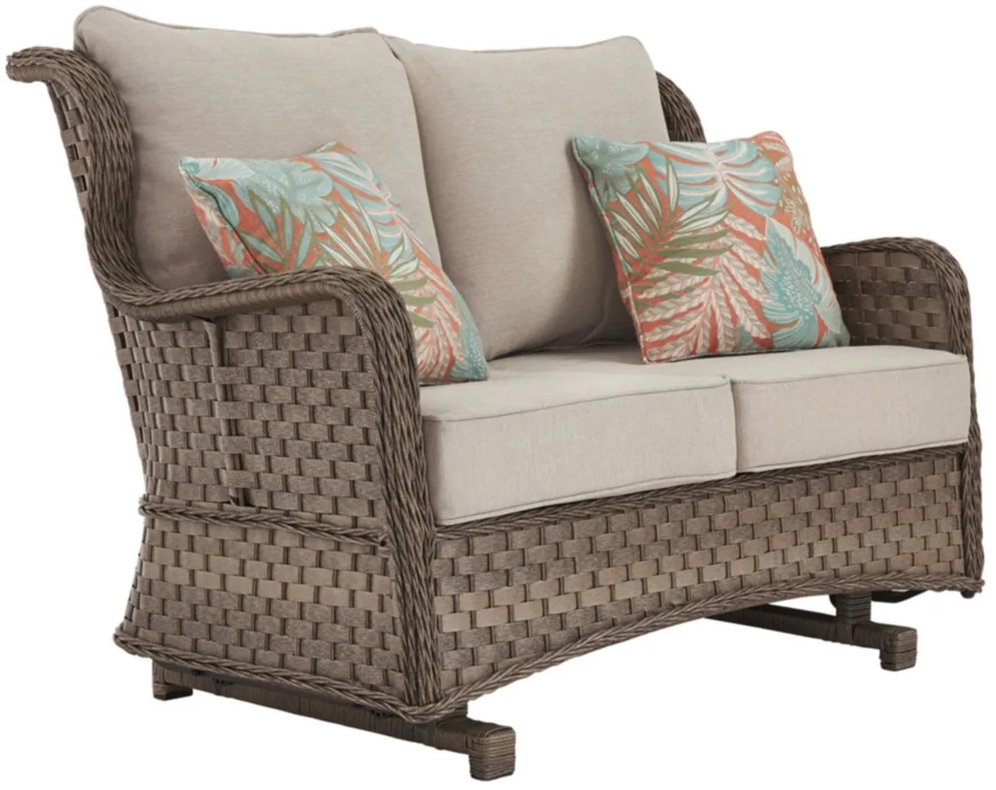 Clear Ridge Outdoor Loveseat Glider with Cushions in Driftwood Gray by Ashley Furniture