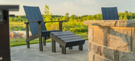Generation Recycled Outdoor Modern Adirondack Footstool in Black by C.R. Plastic Products