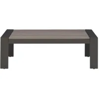Tropicava Casual Outdoor Rectangular Cocktail Table in Taupe by Ashley Express