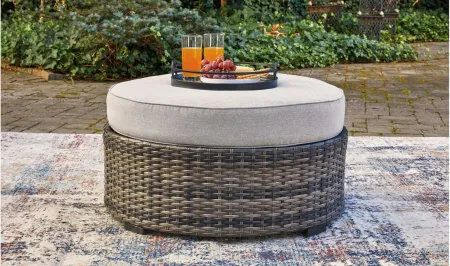 Harbor Court Ottoman with Cushion in Gray by Ashley Furniture