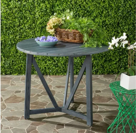 Prenza Outdoor Round Table in Slate Gray by Safavieh