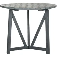 Prenza Outdoor Round Table in Slate Gray by Safavieh