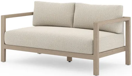 Auberon Outdoor Loveseat in Faye Sand by Four Hands