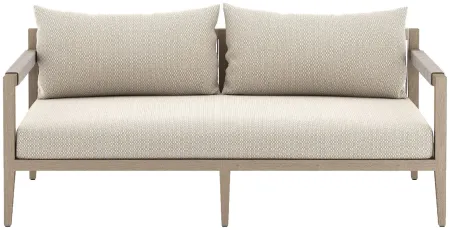 Sherwood Outdoor 63" Sofa in Faye Sand by Four Hands