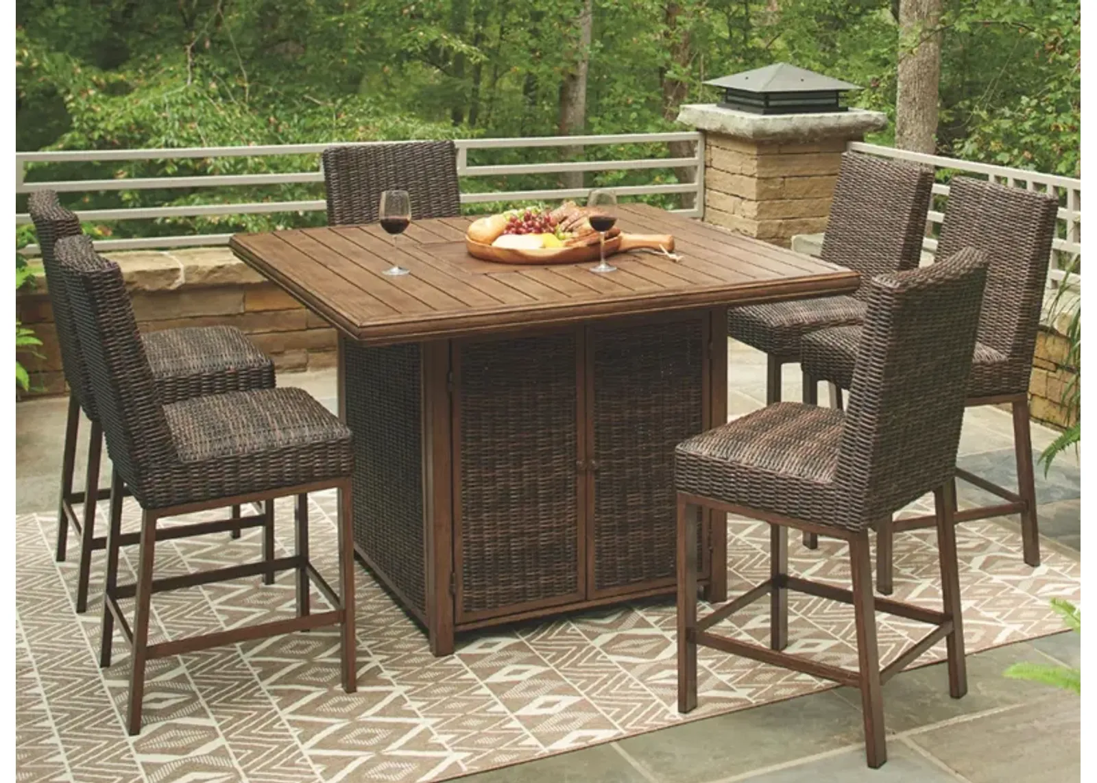 Paradise Trail 7-pc. Outdoor Fire Pit Set in Medium Brown by Ashley Furniture