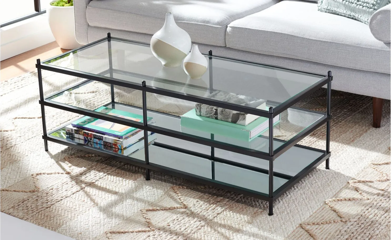 Keelin Glass And Mirror Coffee Table in Matte Black by Safavieh