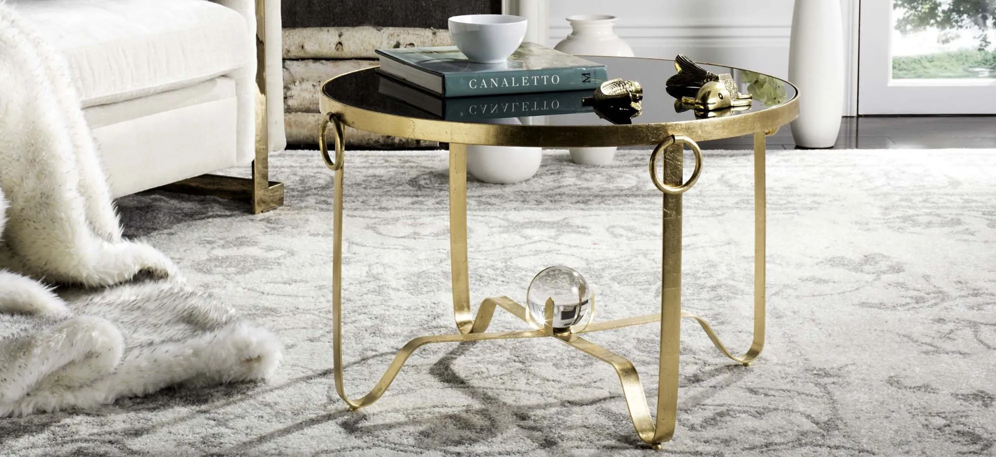 Mona Gold Leaf Round Coffee Table in Gold by Safavieh