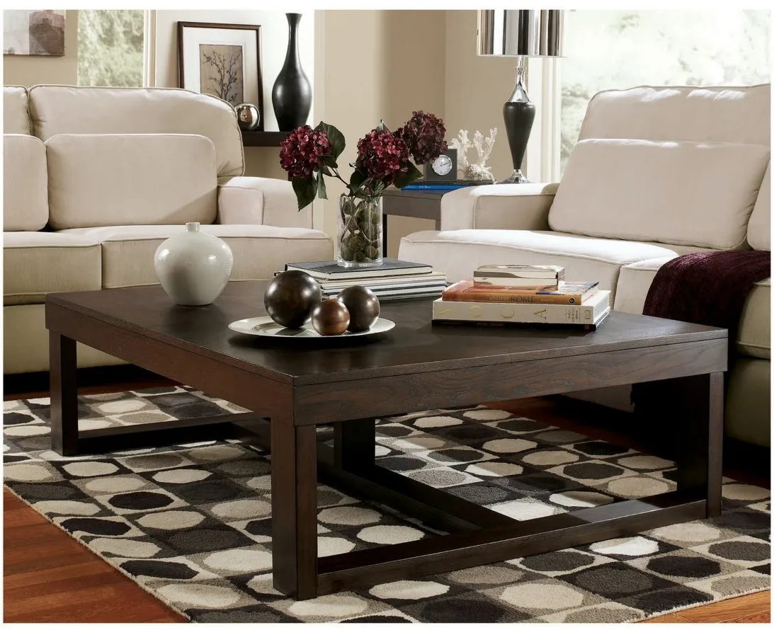 Tula Rectangular Cocktail Table in Dark Brown by Ashley Furniture