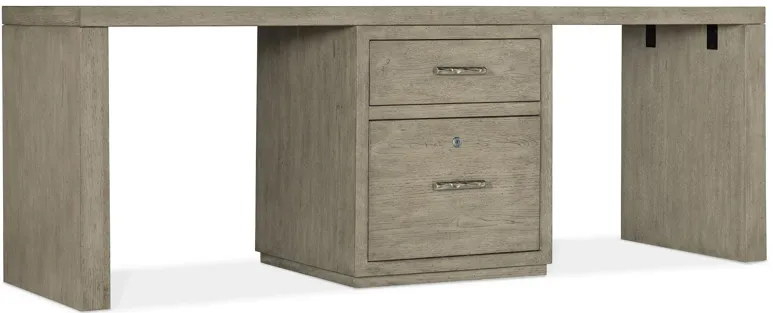 Linville Falls 84" Desk w/ Center File in Mink: A soft smoked gray finish. Textured metal bar pulls in an antique pewter finish. by Hooker Furniture