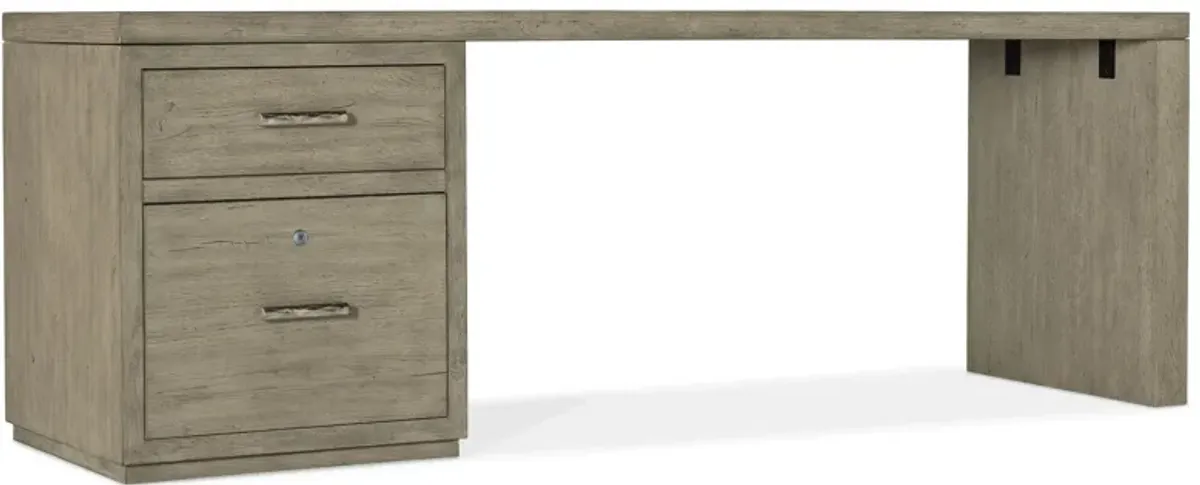 Linville Falls 84" Desk w/ File in Mink: A soft smoked gray finish. Textured metal bar pulls in an antique pewter finish. by Hooker Furniture