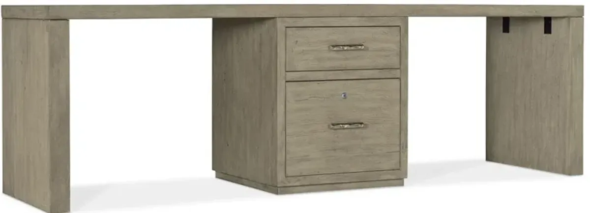 Linville Falls 96" Desk w/ Center File in Mink: A soft smoked gray finish. Textured metal bar pulls in an antique pewter finish. by Hooker Furniture