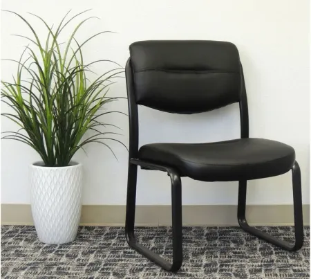 Merit Collection Armless Guest Chair in Black Leather Soft Vinyl; Black by Coe Distributors