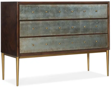 Melange Estrella Three Drawer Chest in Dark wood finish with silver eglomise glass front drawers and gold legs by Hooker Furniture