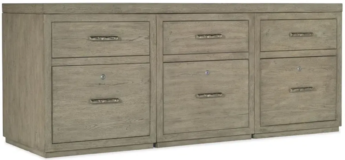 Linville Falls 72" Credenza w/ Three Files in Mink: A soft smoked gray finish. Textured metal bar pulls in an antique pewter finish. by Hooker Furniture