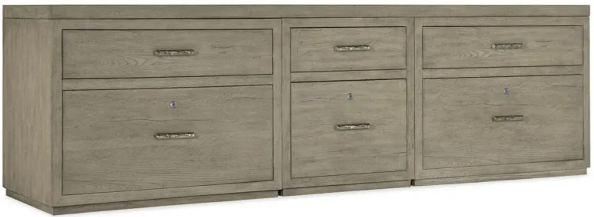 Linville Falls 96" Credenza in Mink: A soft smoked gray finish. Textured metal bar pulls in an antique pewter finish. by Hooker Furniture