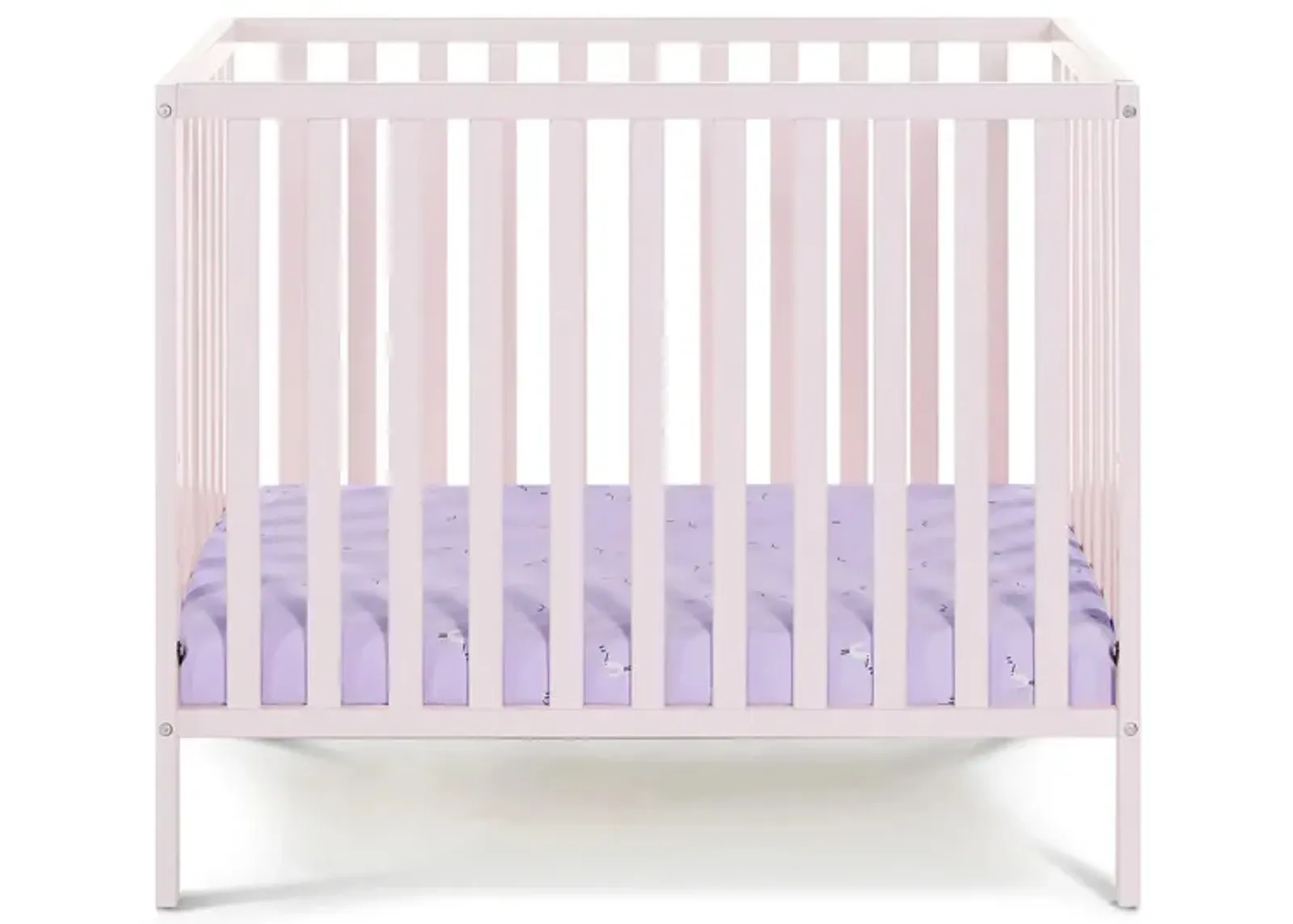 Palmer 3-in-1 Convertible Mini Crib W/ Mattress Pad in Pastel Pink by Heritage Baby