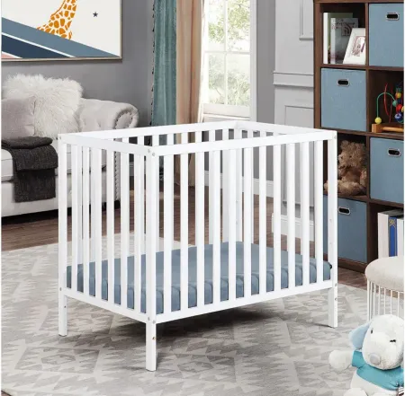 Palmer 3-in-1 Convertible Mini Crib W/ Mattress Pad in White by Heritage Baby