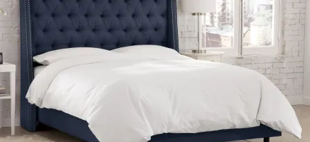 Sheridan Wingback Bed in Linen Navy by Skyline