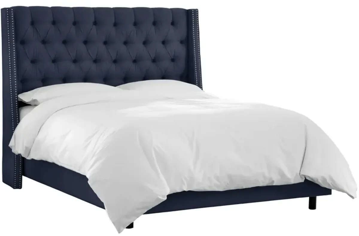 Sheridan Wingback Bed in Linen Navy by Skyline